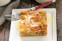 Comforting Cinnamon Bread Pudding with Warm Whiskey Butterscotch