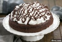 Decadent Flourless Chocolate Cake with Fluffy Marshmallow Topping