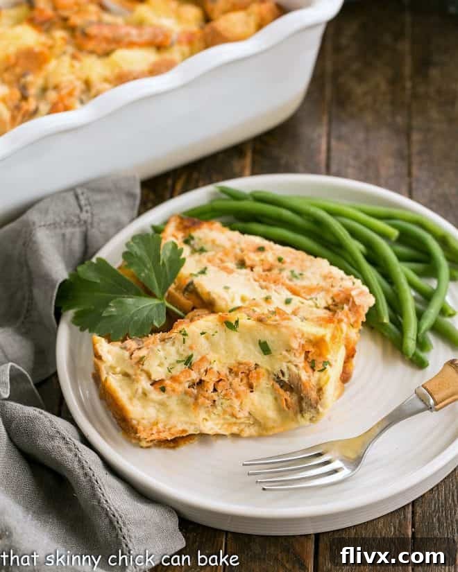 Step 6: Two perfectly baked slices of salmon loaf on a white plate, accompanied by a vibrant serving of green beans, ready for a delicious meal.
