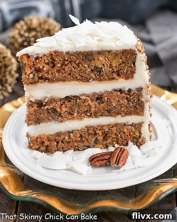 Slice of 3 Caramel Filled Carrot Cake on a white dessert plate