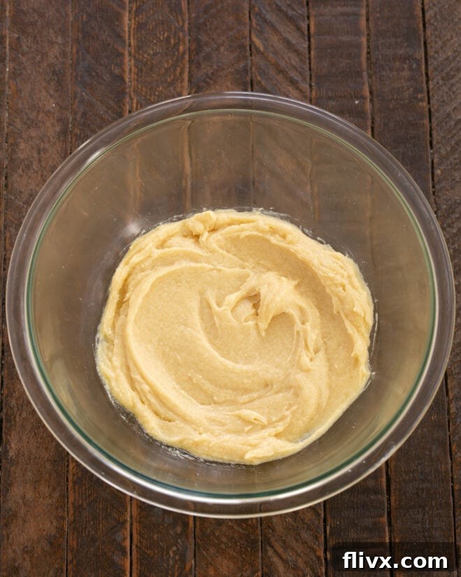 Vanilla and an egg beaten into the butter and sugar mixture for cookie dough.