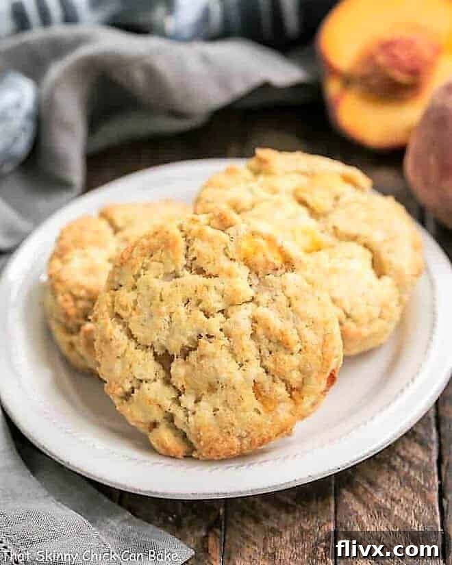3 Brown Butter Peach Scones on a round white plate.