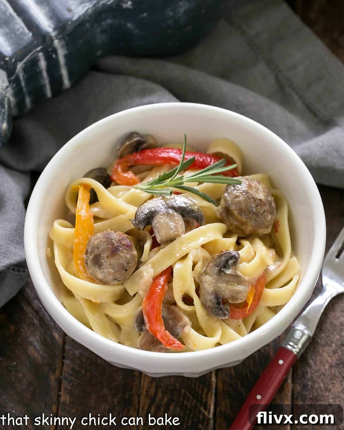 Overhead view of a bowl of Sausage, Pepper, Mushroom Fettuccine.