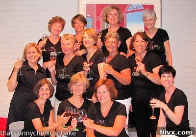 My book club toasting at our summer gathering, a moment of friendship and delicious food.