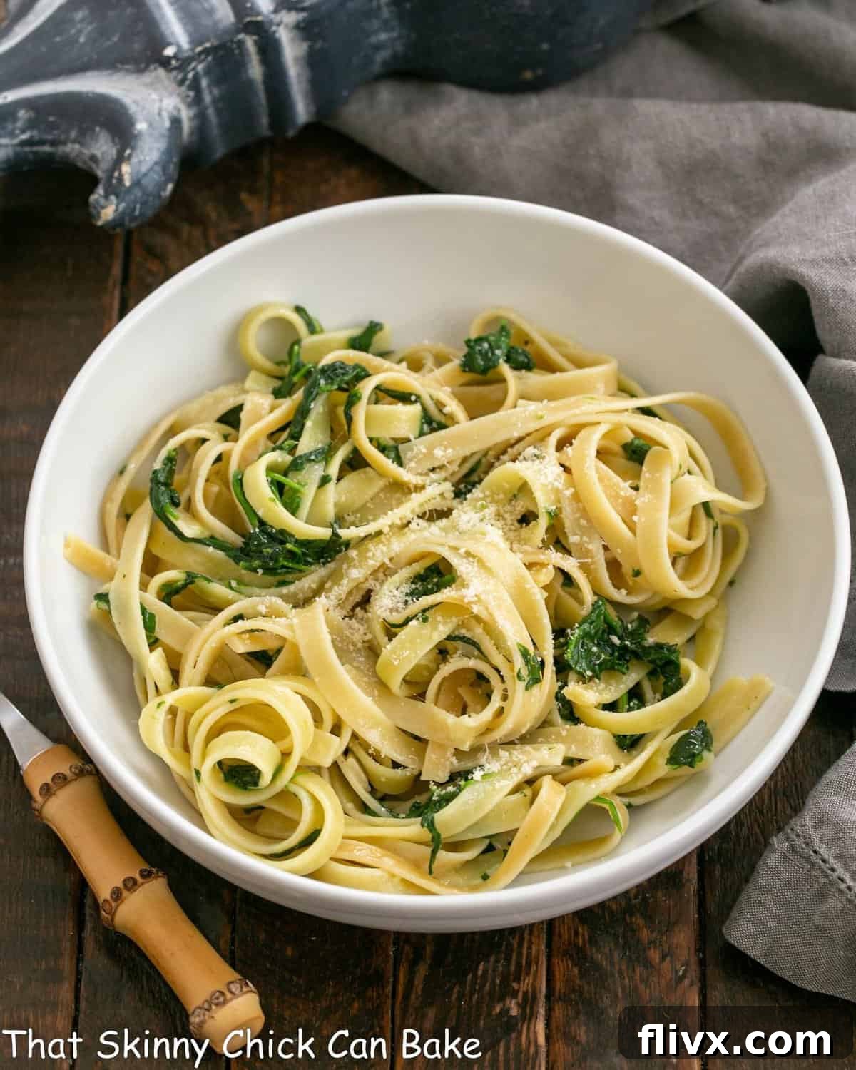 Overhead view of Fettuccine Pasta in a white serving bowl.