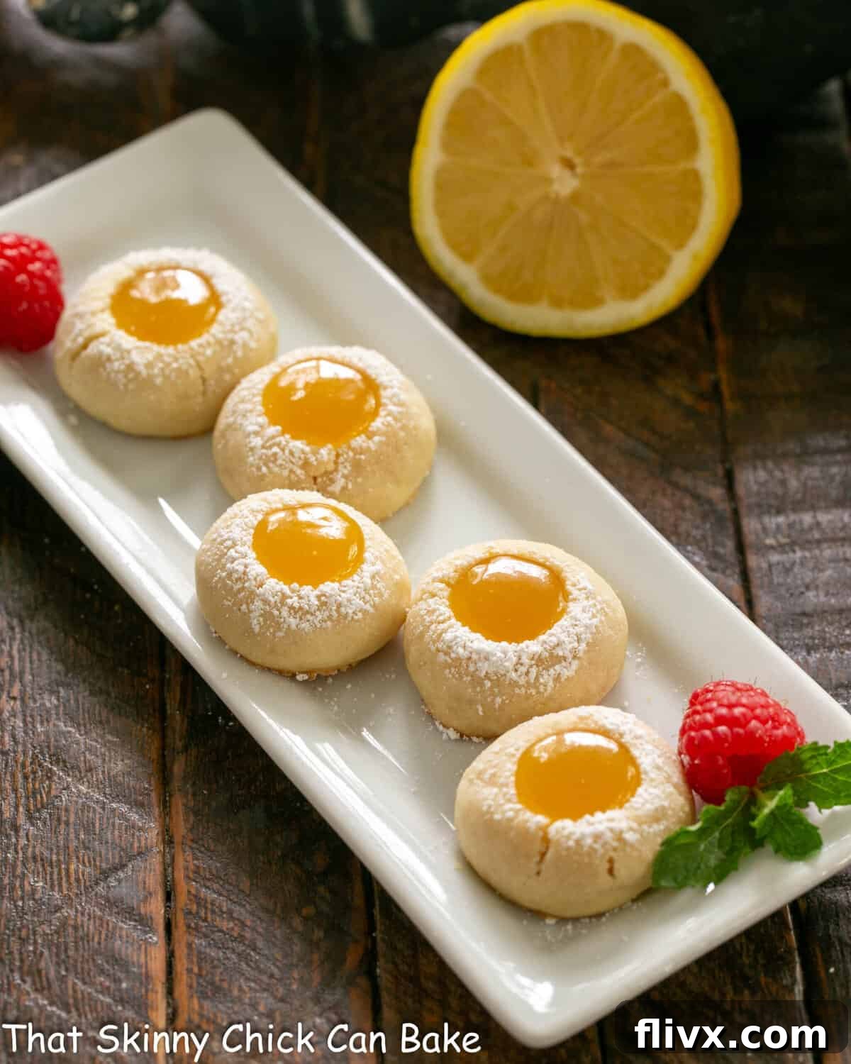 Lemon thumbprints on a white serving dish.