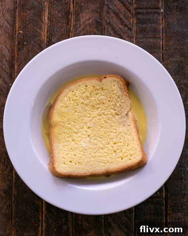 Golden Brown Sweet and Savory Monte Cristo 6 Bread dipped in egg wash.