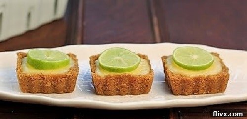 Key Lime Tarts original photo, showing a different presentation style with crusts extending up the sides of the tart molds.