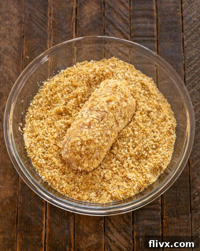 Step 6: Coat in a mixture of crushed croutons and Parmesan.