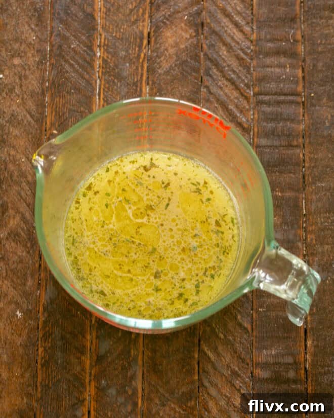 Finished marinade in a liquid measuring cup.