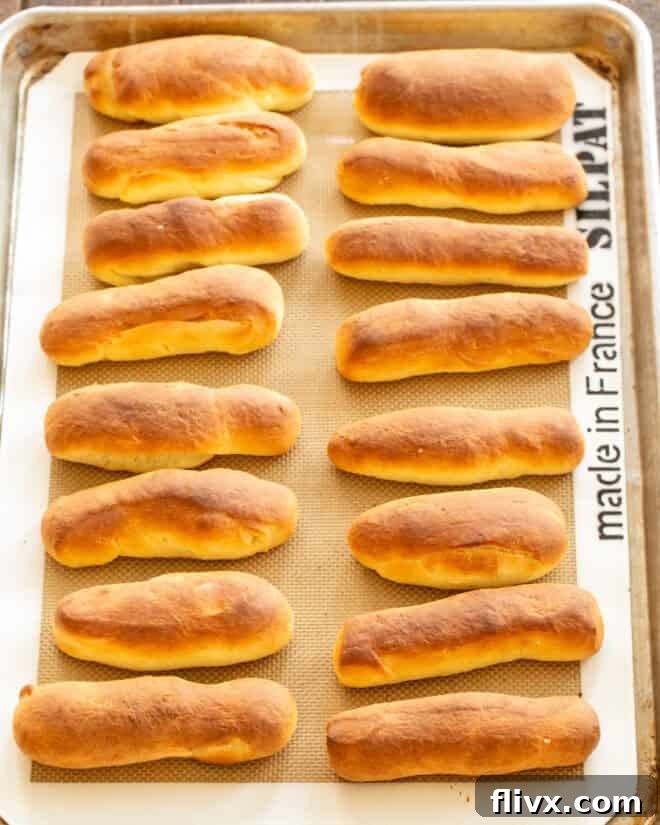 Shaping breadstick dough into ropes.