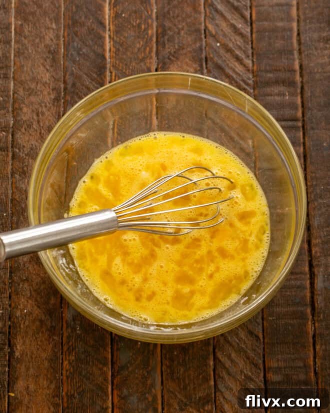 Whisk the eggs and sugar together, then whisk in the cream.