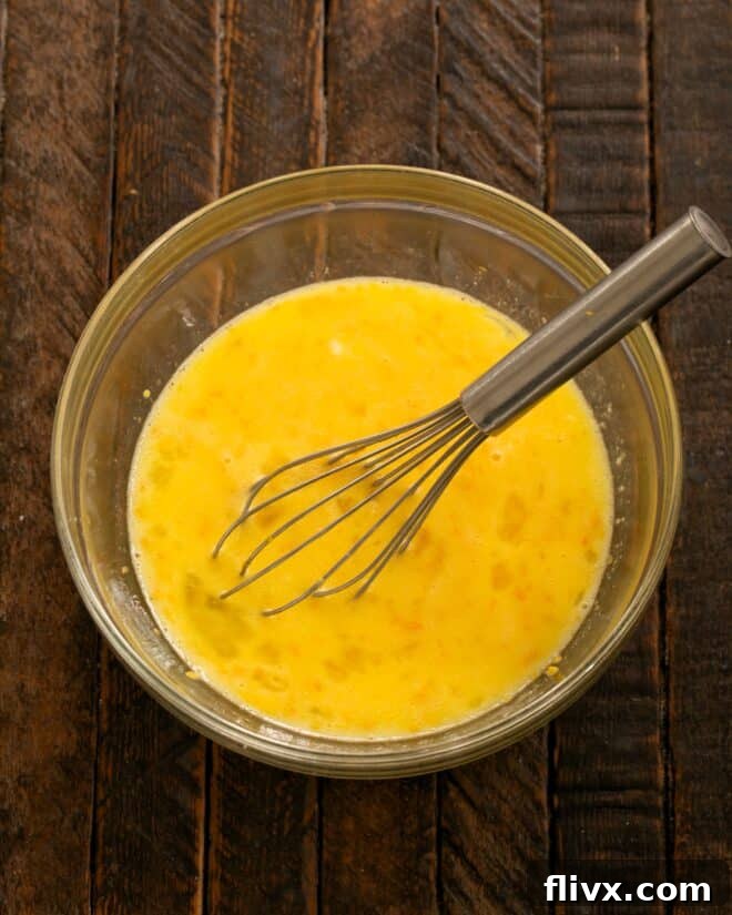 Next, whisk in the lemon zest and juice.