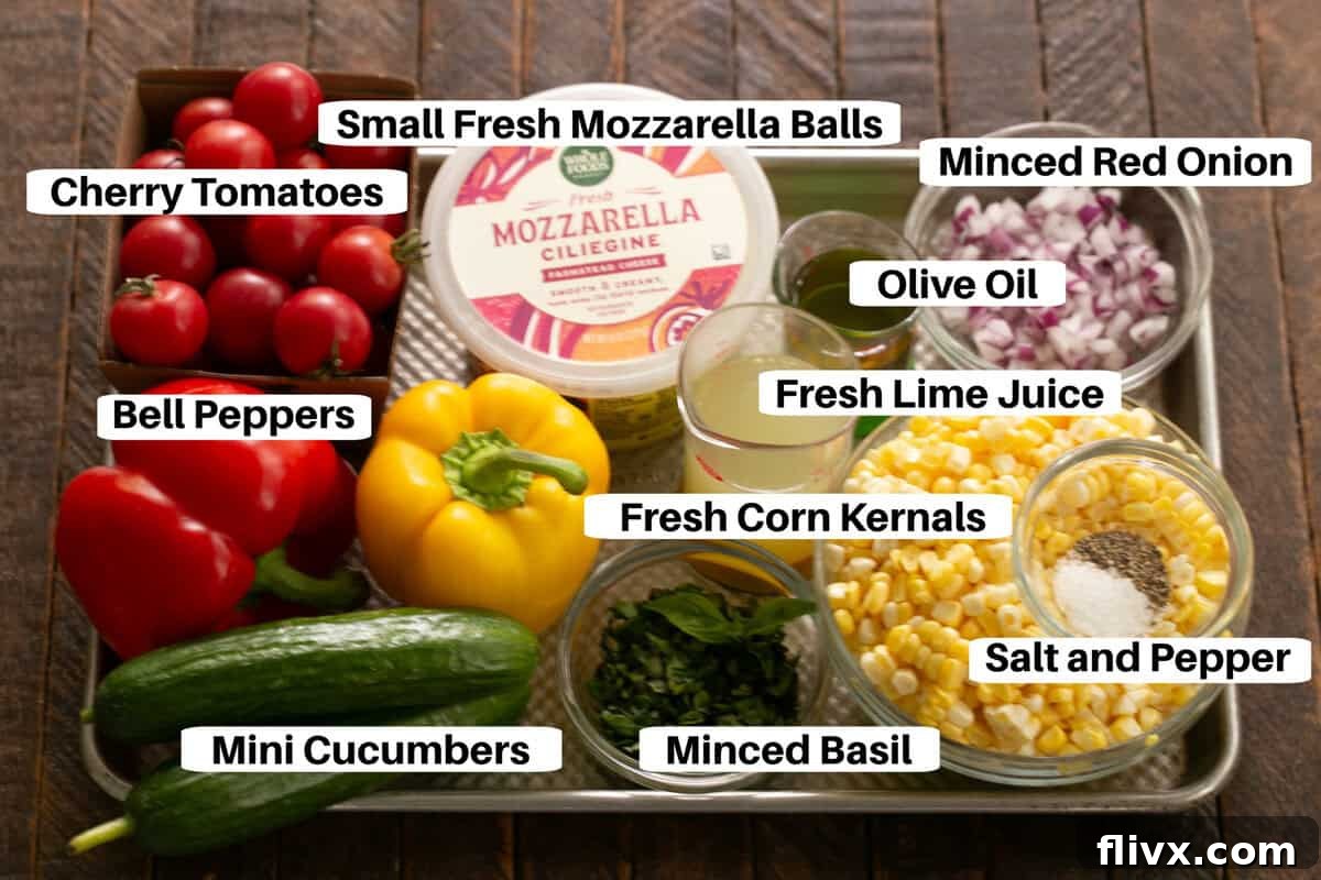 A close-up shot of the vibrant Rainbow Summer Salad in a bowl, showing the texture and freshness of the chopped ingredients.