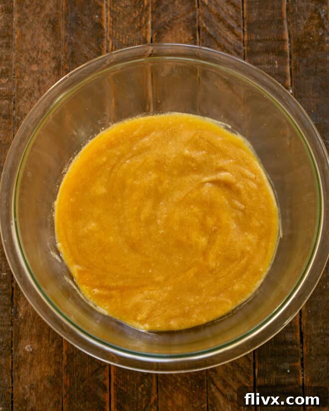 One whole egg and one egg yolk added to the creamed butter and sugar mixture.