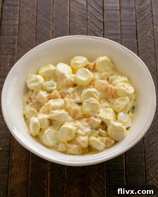 Mixed fruit with dressing.