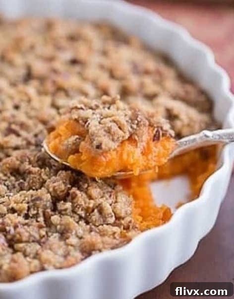 Praline Topped Sweet Potato Casserole baking in the oven.
