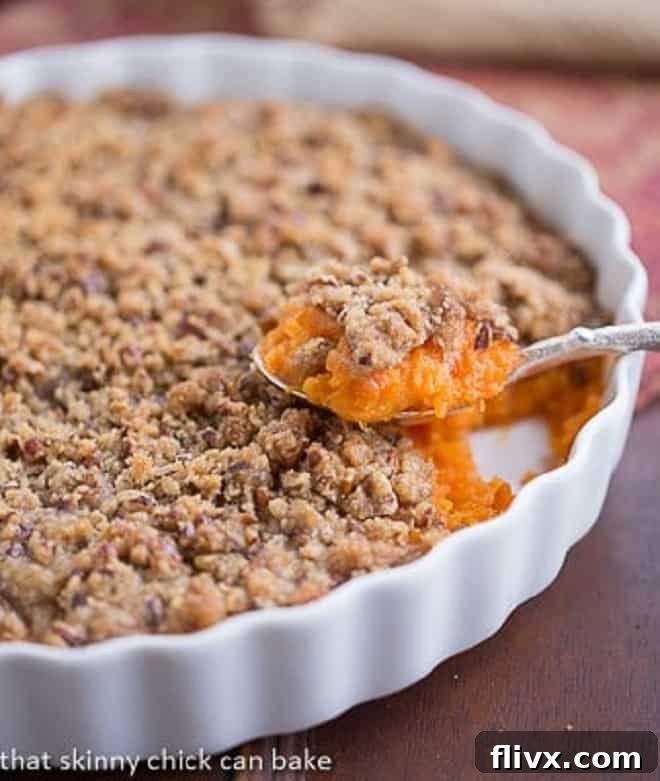 Praline Topped Sweet Potato Casserole - A perfect Thanksgiving side dish that even sweet potato naysayers will adore!