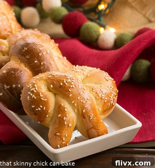 Beautifully braided Challah Pretzels, golden and glistening, ready to be devoured.