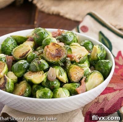 Brussels Sprouts with Bacon, Shallots and Garlic in a white serving bowl
