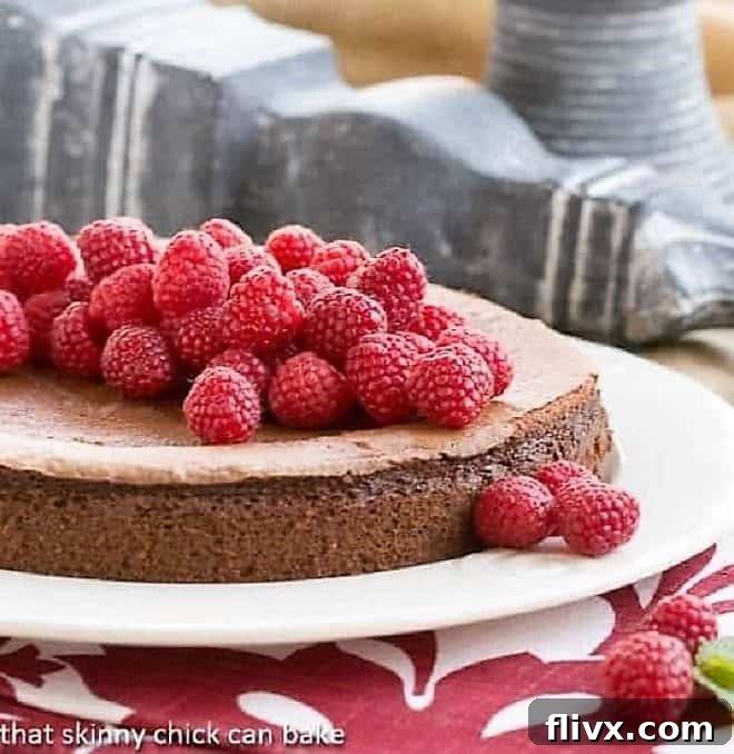 Chocolate Mousse Torte covered with fresh raspberries