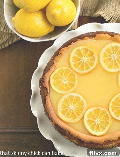 Lemon Bar Cheesecake | A luscious citrus cheesecake loaded with lemon curd