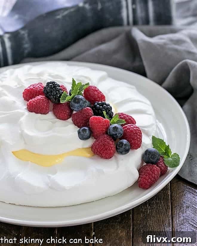Lemon Pavlova on a white serving plate