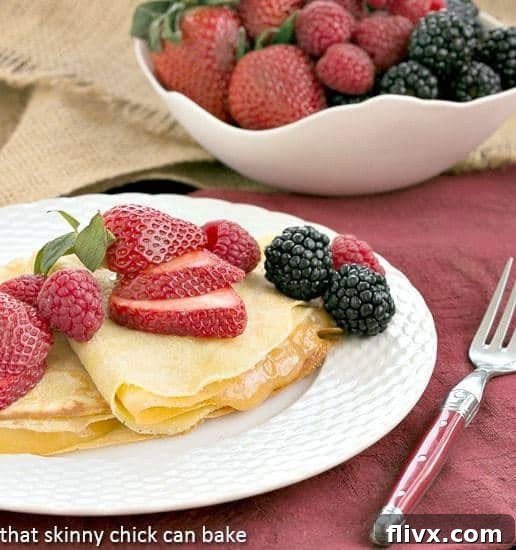 Butter and Rum Crepes | Dosed with Grand Marnier and rum and filled with lemon curd, these are no ordinary crepes!