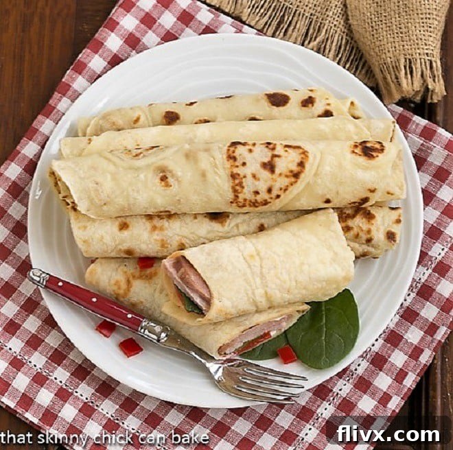 Freshly cooked Potato Lefse on a white plate, ready to be served.