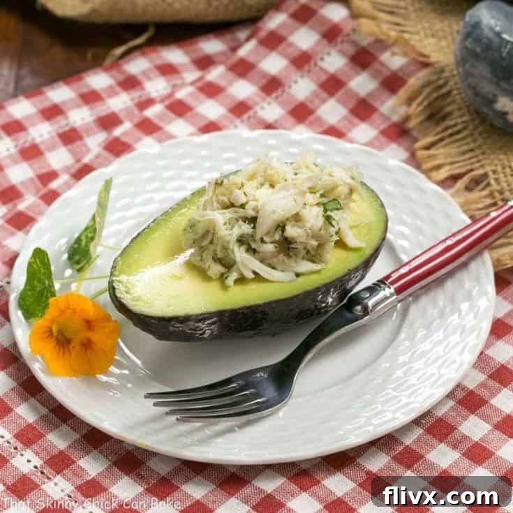Crab Avocado Ravioli | An elegant, delectable crab salad presentation, featuring fresh ingredients and vibrant colors.