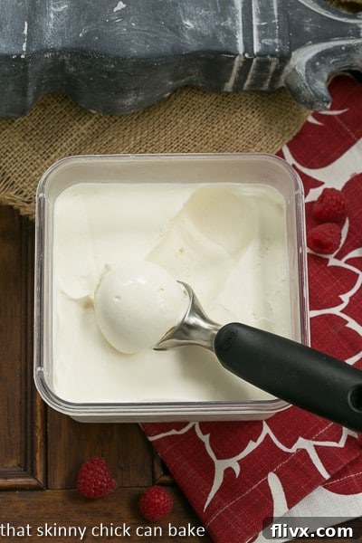 Creamy Homemade Cheesecake Ice Cream in an OXO storage container, ready to be frozen or served