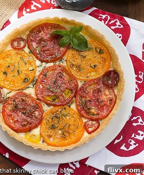 Summer Tomato Tart on a red and white napkin.