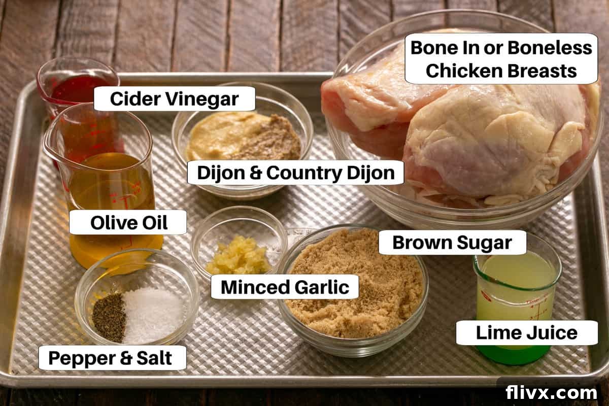 A vibrant array of chicken marinade ingredients meticulously arranged on a clean sheet pan, each clearly labeled for easy identification.