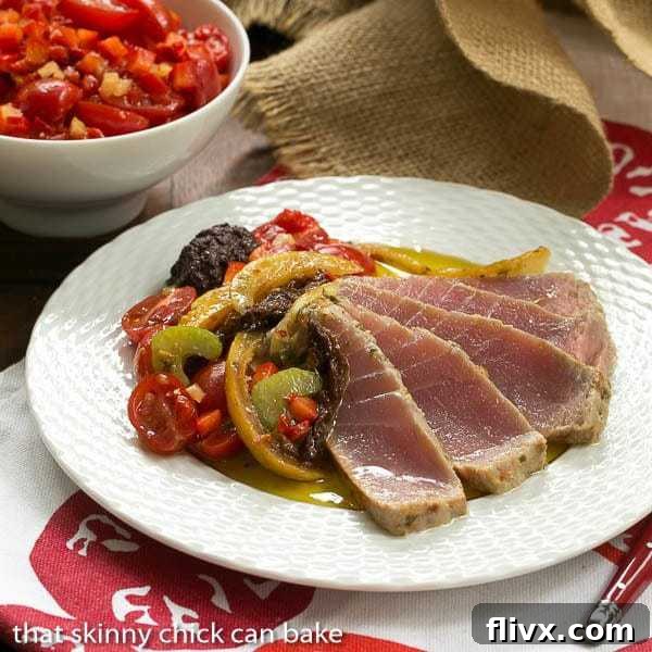 Exquisite Tuna Confit served with Black Olive Tapenade and fresh Tomato Salsa