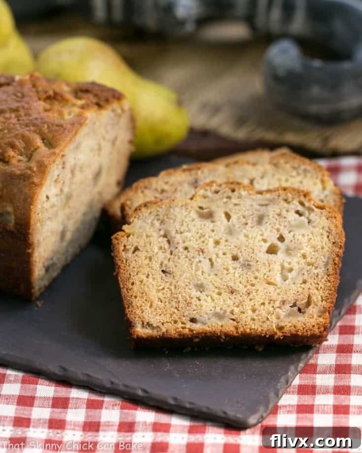 Sour Cream Pear Bread | A delectable autumn quick bread with subtle warm spices and chunks of fresh pears