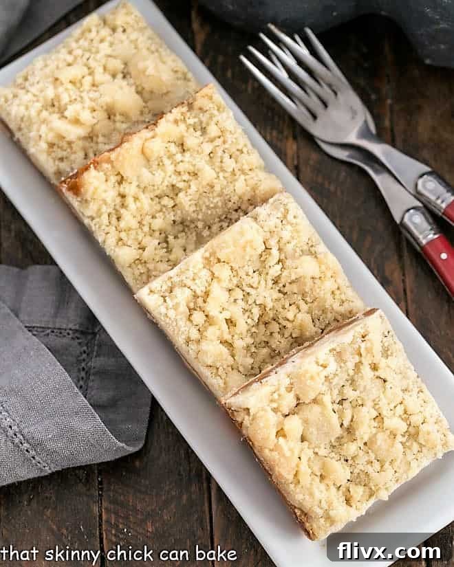 Overhead view of caramel bars on a white tray