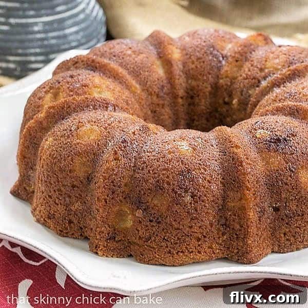 Apple Ginger Coffee Cake on a white serving plate
