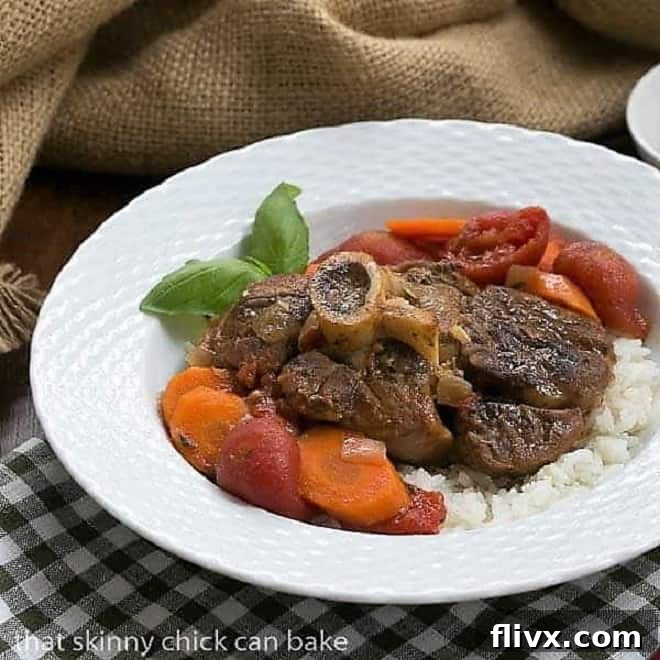 Osso Buco a L'arman over rice in a white bowl