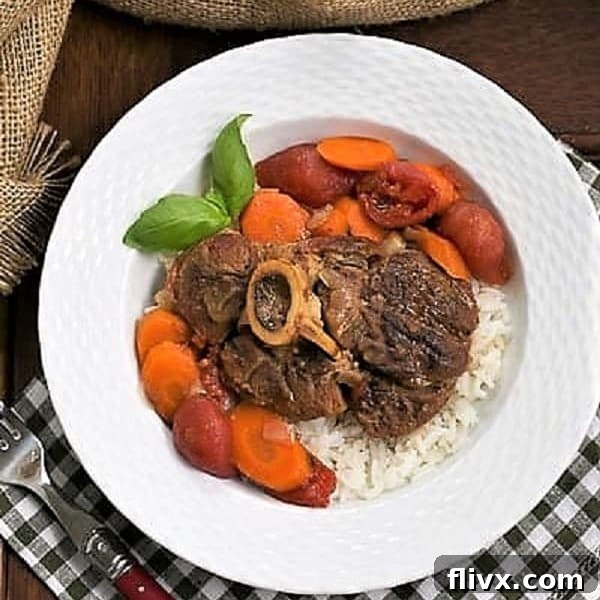 Overhead view of Osso Buco a L'arman in a white bowl over a green and white checked napkin.