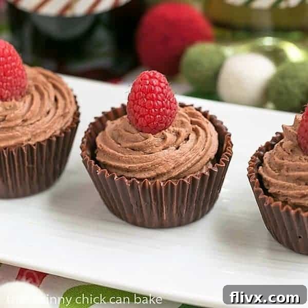 Chocolate Mousse Cups elegantly arranged on a pristine white ceramic tray, highlighting their perfect form and inviting appeal