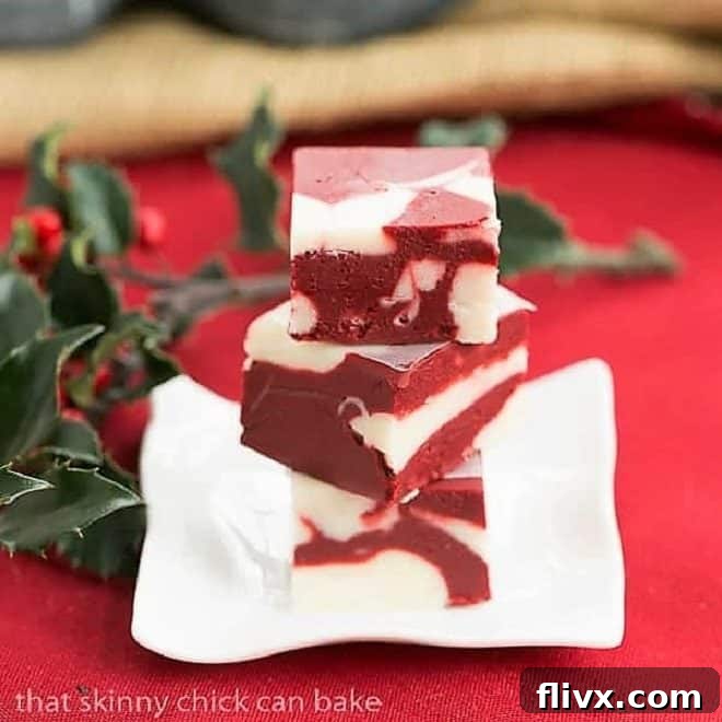 Red Velvet Fudge on a small square rippled plate, beautifully marbled with red and white.