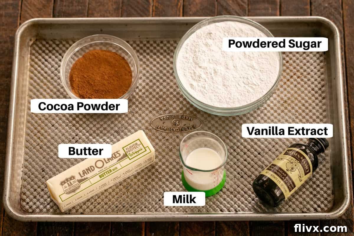 Frosting ingredients for Frosted Brownies laid out on a sheet pan, ready for mixing.