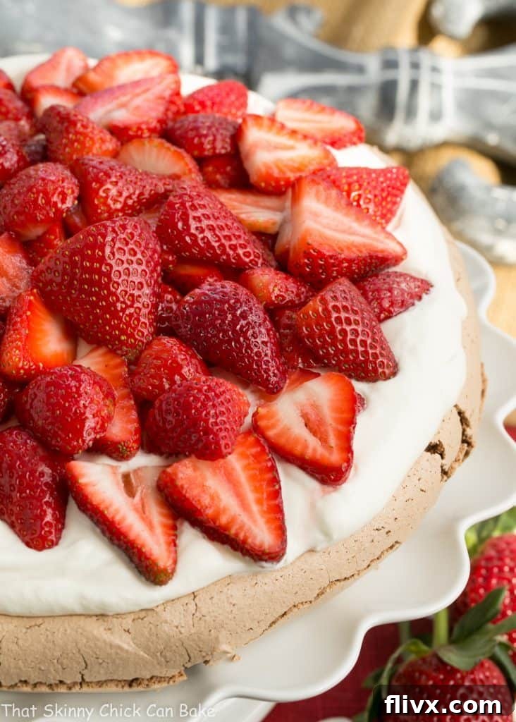 Chocolate Pavlova - A chocolate meringue topped with mascarpone cream and luscious strawberries, close-up