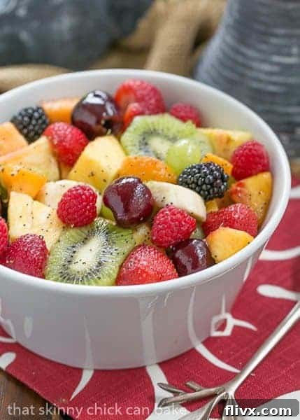 Honey Lime Fruit Salad | Scrumptious fresh fruit dressed with honey, lime juice, vanilla and poppy seeds