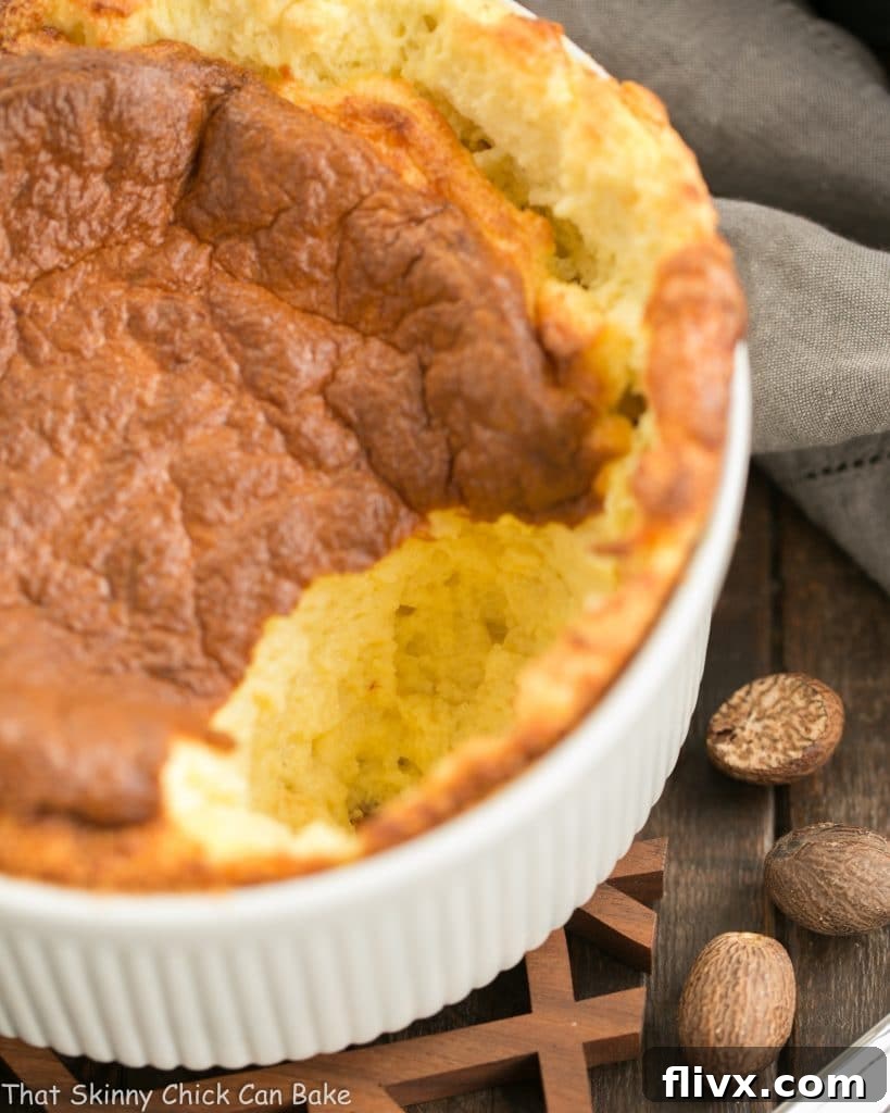 Inside view of a perfectly baked French Gruyere Souffle, showing its airy, fluffy, and tender texture