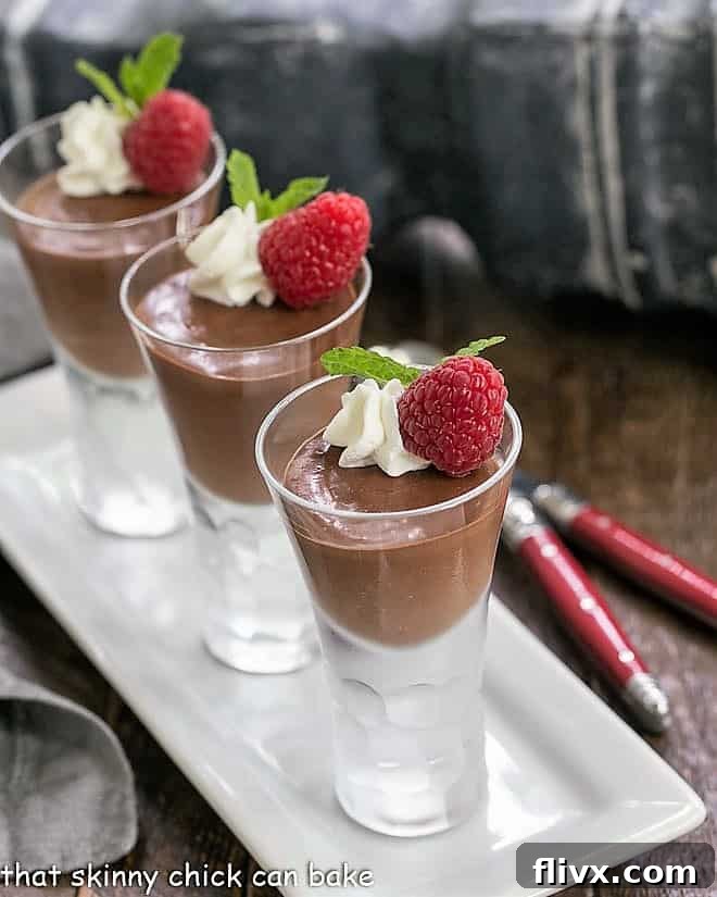 Elegantly served Blender Chocolate Mousse in cordial glasses, resting on a pristine white tray, inviting a moment of pure indulgence.