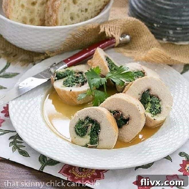 Chicken Saltimbocca Pinwheels on a white ceramic basket weave plate with a red knife