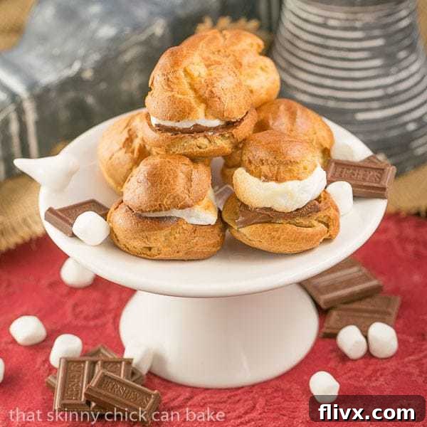 S'mores Cream Puffs stacked up on a small cake stand!