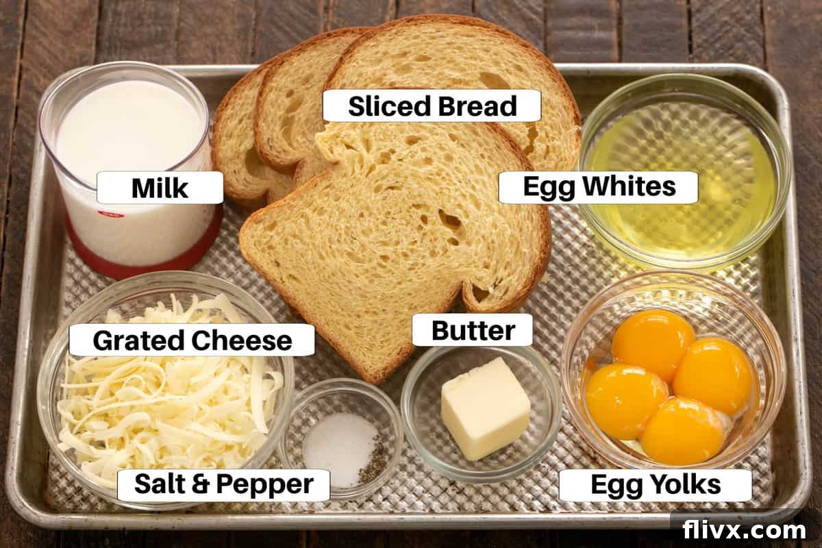 Ingredients for Cheese Soufflé laid out on a sheet pan with descriptive labels.