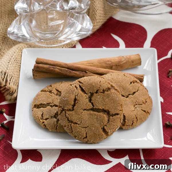 Chewy triple ginger snap cookies, featuring a crackled top and a sprinkle of sugar.